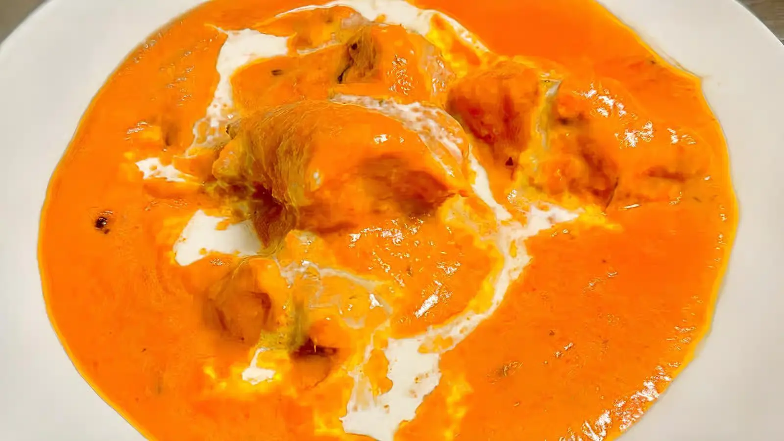Delicious Butter Chicken dish at Spicy Delight Indian Bistro & Bar in Edmonton, AB